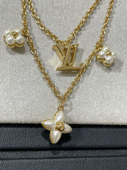 {
  "Bling Jewelrys ": "ブリングジュエリー",
  "FLOWERGRAM GOLD MOP DOUBLE ROW NECKLACE": "フラワーグラム ゴールド マザーオブパール 2連ネックレス"
}
