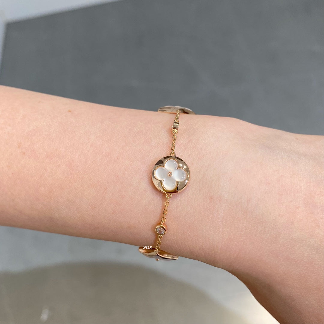 [Bling Jewelrys ]STAR AND SUN 4 MOTIF WHITE MOP PINK GOLD BRACELET