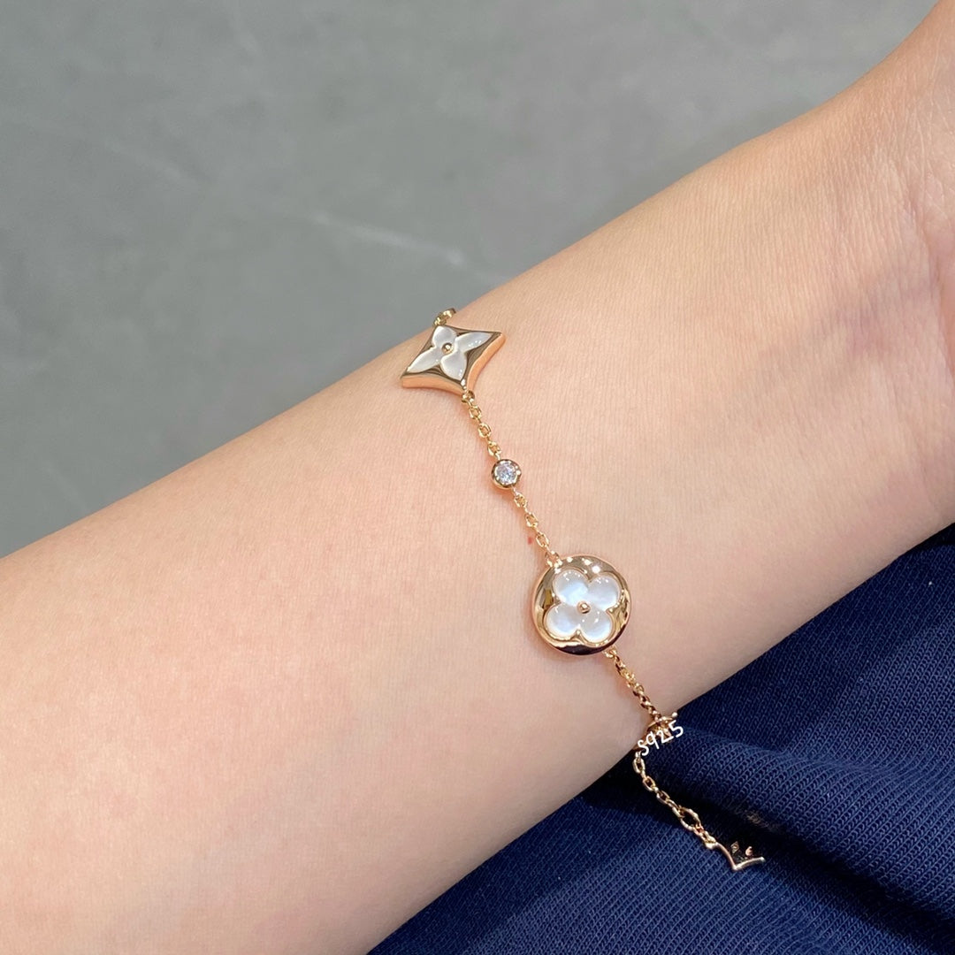 [Bling Jewelrys ]STAR AND SUN 4 MOTIF WHITE MOP PINK GOLD BRACELET