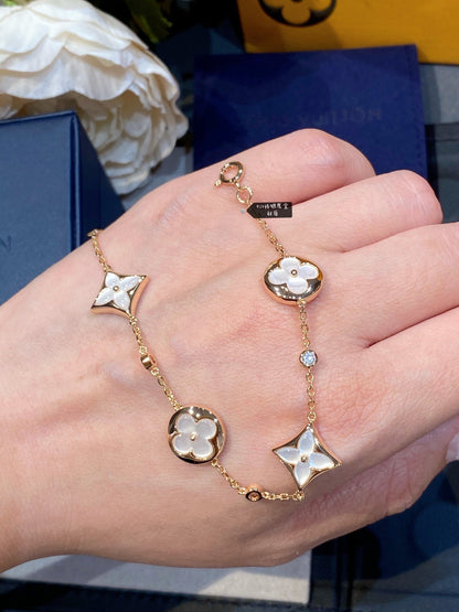 [Bling Jewelrys ]STAR AND SUN 4 MOTIF WHITE MOP PINK GOLD BRACELET