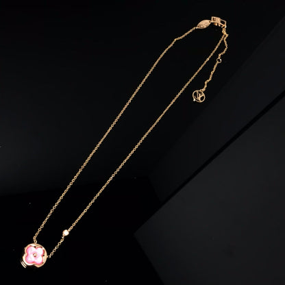 {
  "Bling Jewelrys": "Bling Jewelrys",
  "COLOR BLOSSOM PINK MOP SUN GOLD NECKLACE": "COLOR BLOSSOM ROSA MOP SONNENGOLD-HALSKETTE"
}