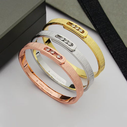 {
  "Bling Jewelrys": "Bling Jewelrys",
  "Move Noa Ciselé bangle": "Move Noa Ciselé Armreif"
}