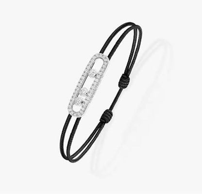 {
  "Bling Jewelrys": "Messika Care(s) Armband mit rosa Kordel und Pavé-Besatz"
}