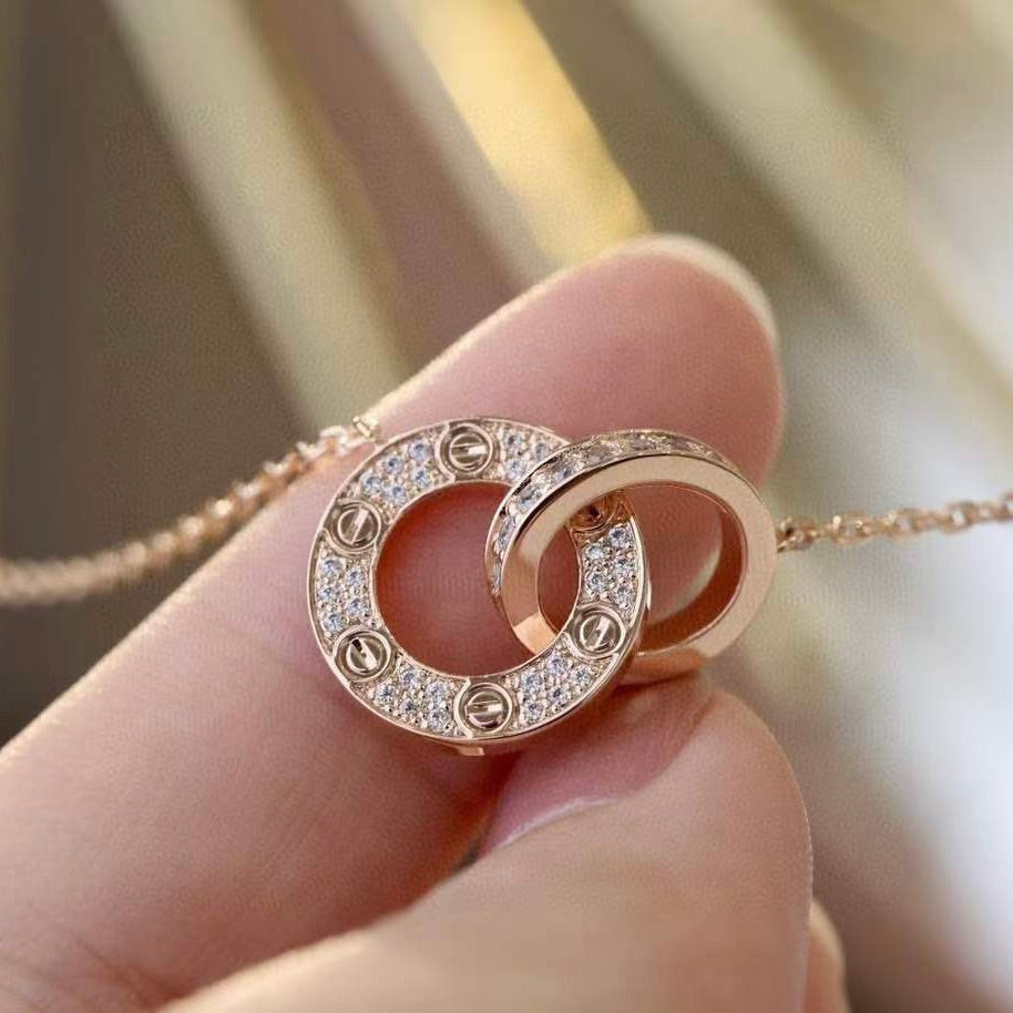 {
  "Bling Jewelrys": "Bling Jewelrys",
  "LOVE 7.6MM NECKLACE ROSE GOLD AND SILVER  FULL DIAMOND": "LOVE 7,6 MM HALSKETTE ROSÉGOLD UND SILBER VOLL DIAMANTBESATZ"
}
