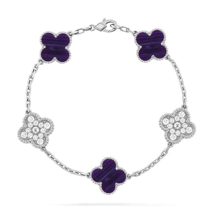 {
  "Bling Jewelrys": "ブリングジュエリー",
  "CLOVER 5 MOTIF PURPLE STRIPES BRACELET COLLECTION": "クローバー 5モチーフ パープルストライプ ブレスレットコレクション"
}