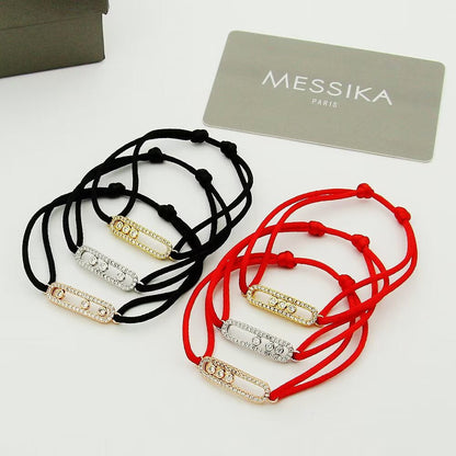 {
  "Bling Jewelrys": "Messika Care(s) Armband mit rosa Kordel und Pavé-Besatz"
}
