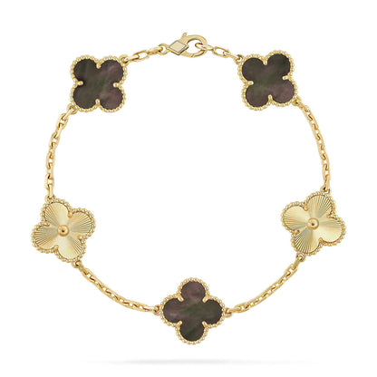 {
  "Bling Jewelrys": "Bling Jewelry",
  "CLOVER 5 MOTIF GRAY MOP BRACELET COLLECTION": "KLEEBLATT 5-MOTIV GRAU PERLMUTT ARMBAND KOLLEKTION"
}