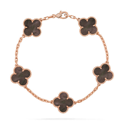 {
  "Bling Jewelrys": "Bling Jewelry",
  "CLOVER 5 MOTIF GRAY MOP BRACELET COLLECTION": "KLEEBLATT 5-MOTIV GRAU PERLMUTT ARMBAND KOLLEKTION"
}