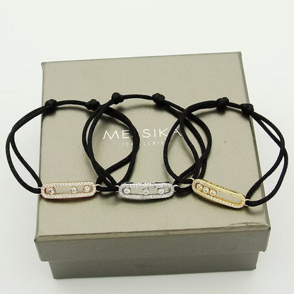{
  "Bling Jewelrys": "Messika Care(s) Armband mit rosa Kordel und Pavé-Besatz"
}