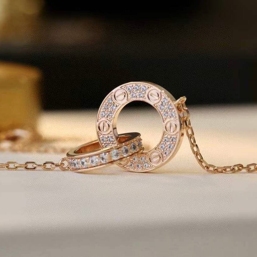 {
  "Bling Jewelrys": "Bling Jewelrys",
  "LOVE 7.6MM NECKLACE ROSE GOLD AND SILVER  FULL DIAMOND": "LOVE 7,6 MM HALSKETTE ROSÉGOLD UND SILBER VOLL DIAMANTBESATZ"
}