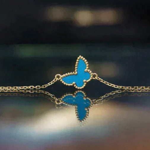 {
  "Bling Jewelrys": "ブリング・ジュエリー",
  "BUTTERFLY TURQUOISE BUTTERFLY BRACELET": "バタフライ ターコイズ バタフライ ブレスレット"
}