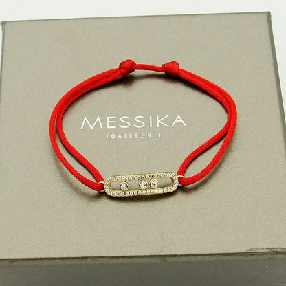 {
  "Bling Jewelrys": "Messika Care(s) Armband mit rosa Kordel und Pavé-Besatz"
}