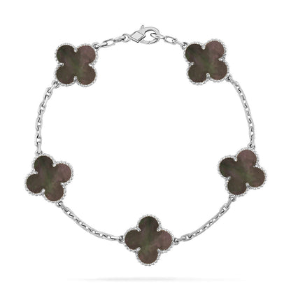 {
  "Bling Jewelrys": "Bling Jewelry",
  "CLOVER 5 MOTIF GRAY MOP BRACELET COLLECTION": "KLEEBLATT 5-MOTIV GRAU PERLMUTT ARMBAND KOLLEKTION"
}