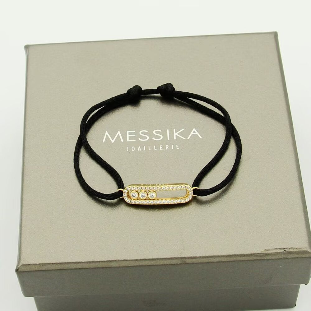 {
  "Bling Jewelrys": "Messika Care(s) Armband mit rosa Kordel und Pavé-Besatz"
}