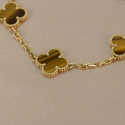 {
  "Bling Jewelrys": "ブリングジュエリー",
  "CLOVER 5 MOTIFS TIGER EYE BRACELET COLLECTION": "クローバー 5モチーフ タイガーアイ ブレスレット コレクション"
}