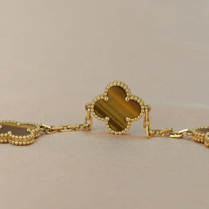 {
  "Bling Jewelrys": "ブリングジュエリー",
  "CLOVER 5 MOTIFS TIGER EYE BRACELET COLLECTION": "クローバー 5モチーフ タイガーアイ ブレスレット コレクション"
}