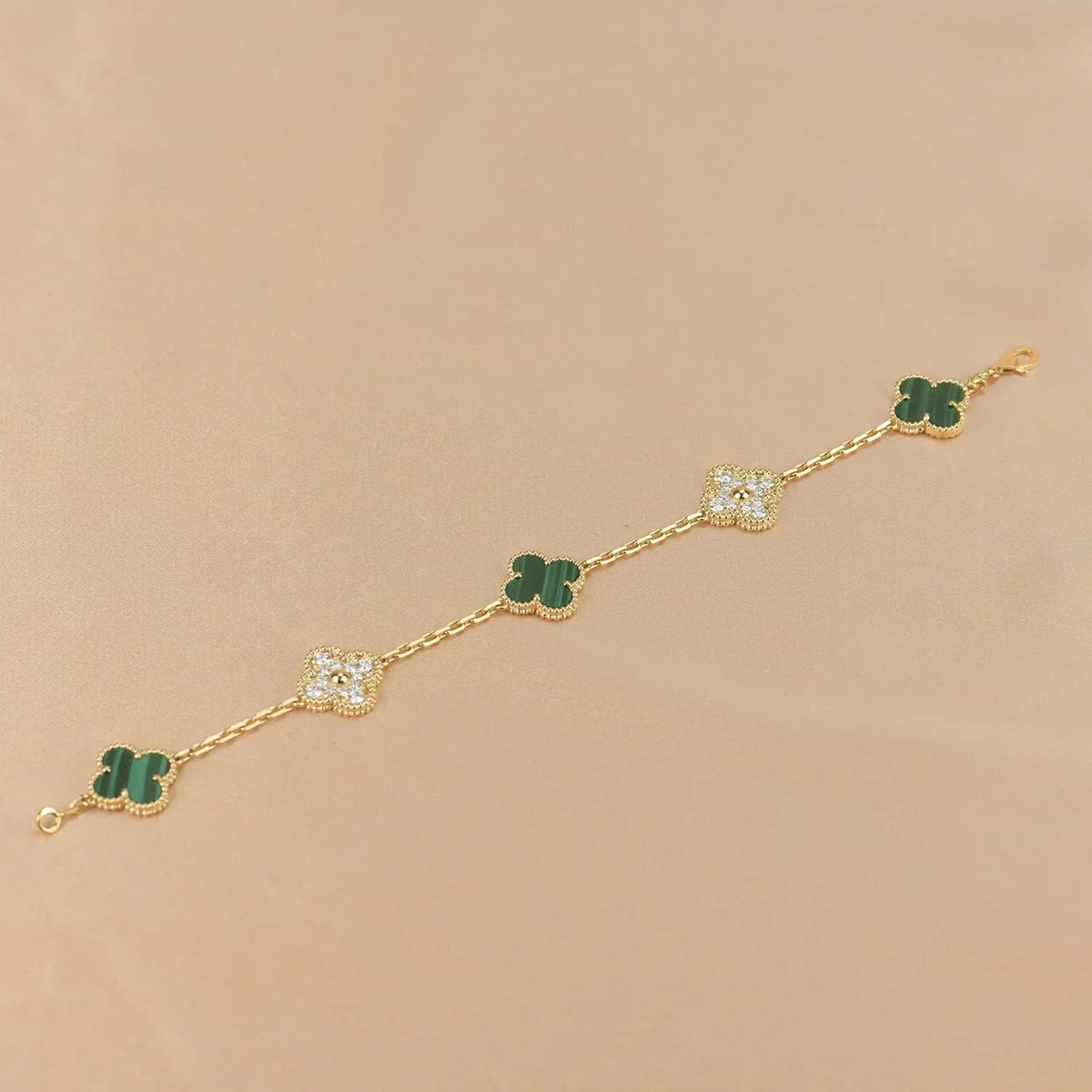 {
  "Bling Jewelrys ": "Bling Jewelrys ",
  "CLOVER  5 MOTIF MALACHITE BRACELET COLLECTION": "KLEEBLATT 5-MOTIV MALACHIT-ARMBAND KOLLEKTION"
}