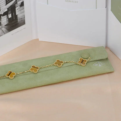 {
  "Bling Jewelrys": "ブリングジュエリー",
  "CLOVER 5 MOTIFS TIGER EYE BRACELET COLLECTION": "クローバー 5モチーフ タイガーアイ ブレスレット コレクション"
}