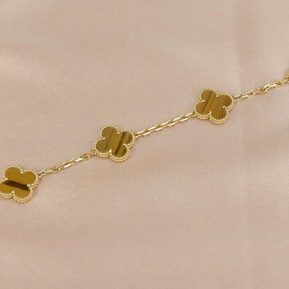 {
  "Bling Jewelrys": "ブリングジュエリー",
  "CLOVER 5 MOTIFS TIGER EYE BRACELET COLLECTION": "クローバー 5モチーフ タイガーアイ ブレスレット コレクション"
}