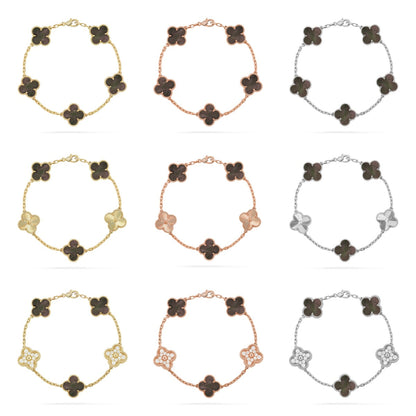 {
  "Bling Jewelrys": "Bling Jewelry",
  "CLOVER 5 MOTIF GRAY MOP BRACELET COLLECTION": "KLEEBLATT 5-MOTIV GRAU PERLMUTT ARMBAND KOLLEKTION"
}