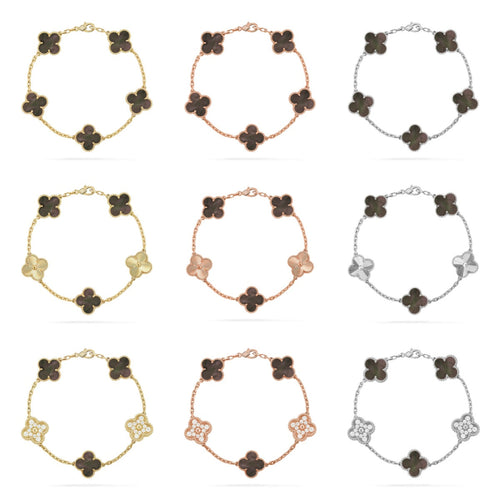{
  "Bling Jewelrys": "Bling Jewelry",
  "CLOVER 5 MOTIF GRAY MOP BRACELET COLLECTION": "KLEEBLATT 5-MOTIV GRAU PERLMUTT ARMBAND KOLLEKTION"
}