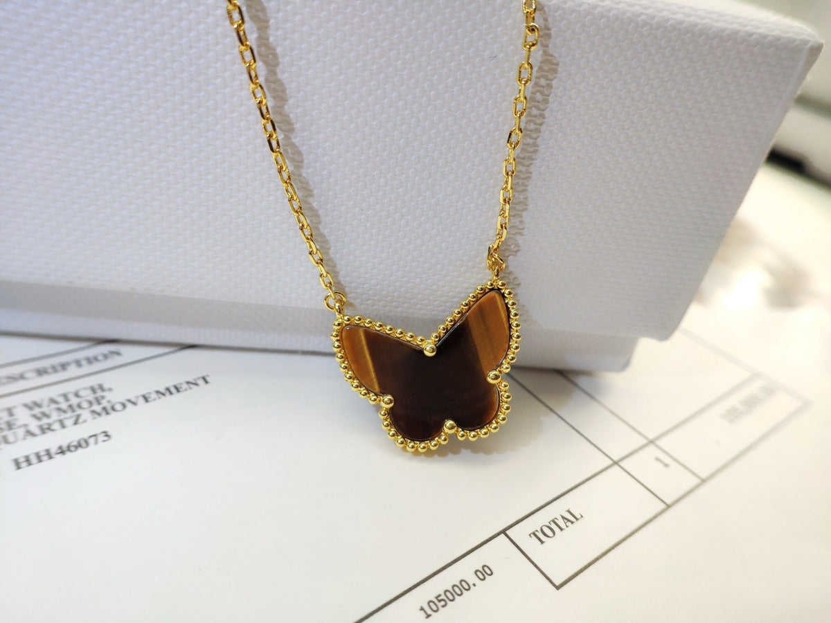 {
"Bling Jewelrys": "Bling Jewelry",
"TIGER__ EYE BUTTERFLY NECKLACE": "TIGERAUGE-SCHMETTERLINGSKETTE"
}