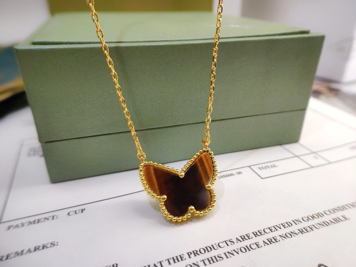 {
"Bling Jewelrys": "Bling Jewelry",
"TIGER__ EYE BUTTERFLY NECKLACE": "TIGERAUGE-SCHMETTERLINGSKETTE"
}