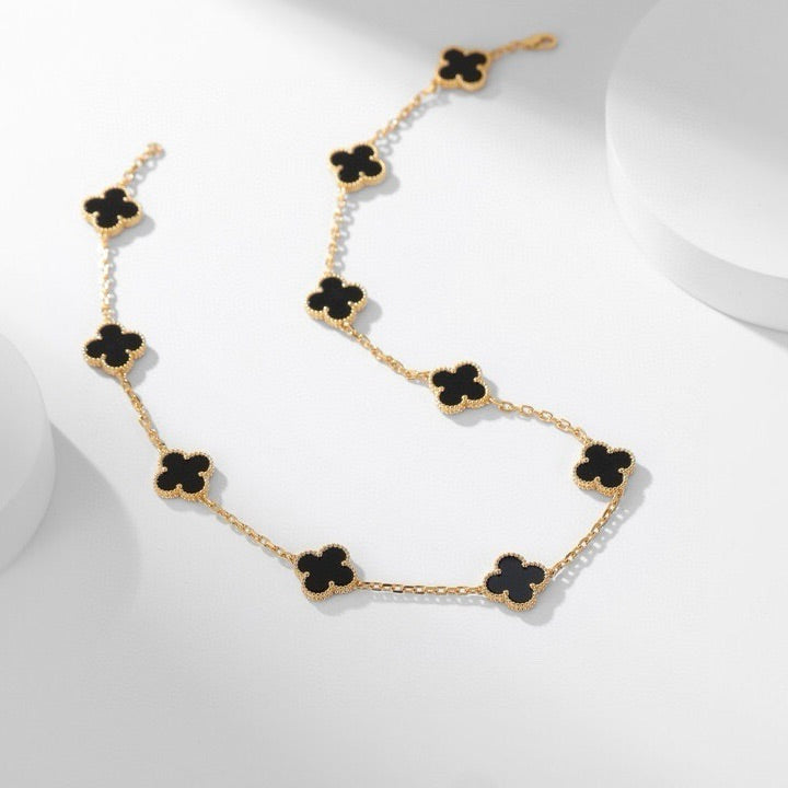{
"Bling Jewelrys ": "Bling Jewelrys ",
"CLOVER 10 MOTIFS ONYX NECKLACE": "KLEEBLATT 10 MOTIVE ONYX HALSKETTE"
}