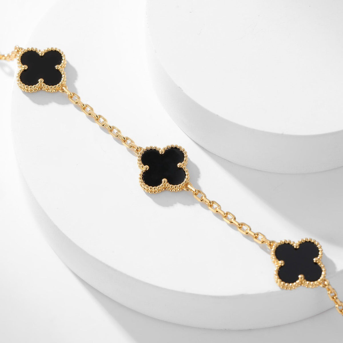 {
"Bling Jewelrys ": "Bling Jewelrys ",
"CLOVER 10 MOTIFS ONYX NECKLACE": "KLEEBLATT 10 MOTIVE ONYX HALSKETTE"
}