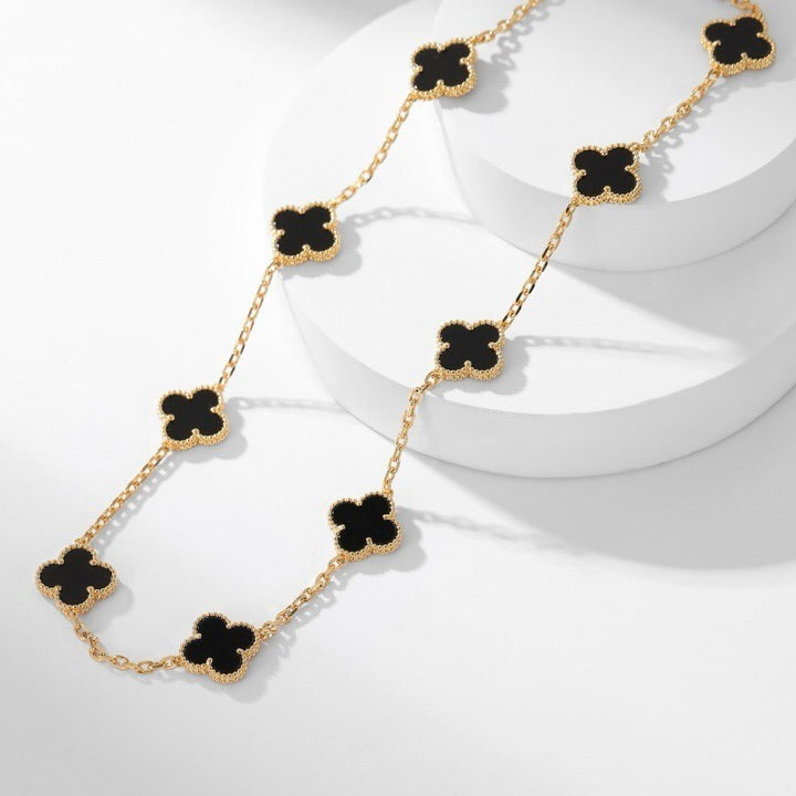 {
"Bling Jewelrys ": "Bling Jewelrys ",
"CLOVER 10 MOTIFS ONYX NECKLACE": "KLEEBLATT 10 MOTIVE ONYX HALSKETTE"
}