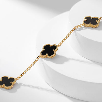 {
"Bling Jewelrys ": "Bling Jewelrys ",
"CLOVER 10 MOTIFS ONYX NECKLACE": "KLEEBLATT 10 MOTIVE ONYX HALSKETTE"
}