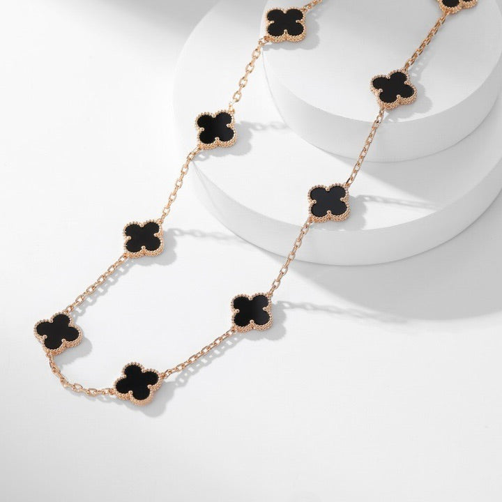 {
"Bling Jewelrys ": "Bling Jewelrys ",
"CLOVER 10 MOTIFS ONYX NECKLACE": "KLEEBLATT 10 MOTIVE ONYX HALSKETTE"
}