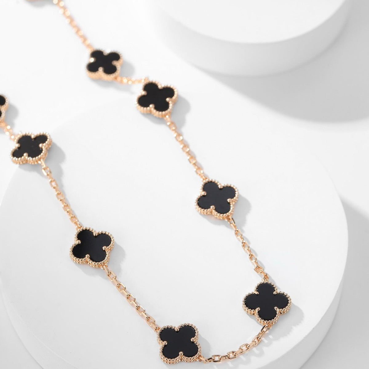 {
"Bling Jewelrys ": "Bling Jewelrys ",
"CLOVER 10 MOTIFS ONYX NECKLACE": "KLEEBLATT 10 MOTIVE ONYX HALSKETTE"
}