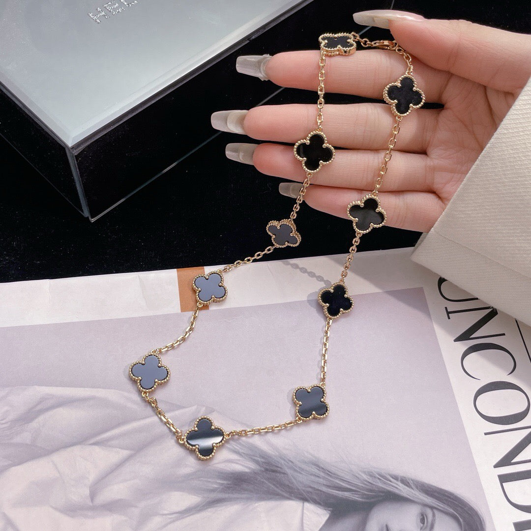 {
"Bling Jewelrys ": "Bling Jewelrys ",
"CLOVER 10 MOTIFS ONYX NECKLACE": "KLEEBLATT 10 MOTIVE ONYX HALSKETTE"
}