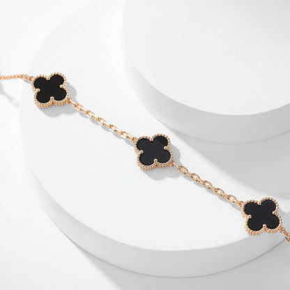 {
"Bling Jewelrys ": "Bling Jewelrys ",
"CLOVER 10 MOTIFS ONYX NECKLACE": "KLEEBLATT 10 MOTIVE ONYX HALSKETTE"
}