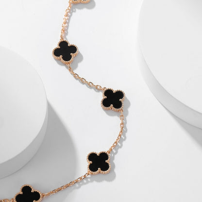 {
"Bling Jewelrys ": "Bling Jewelrys ",
"CLOVER 10 MOTIFS ONYX NECKLACE": "KLEEBLATT 10 MOTIVE ONYX HALSKETTE"
}