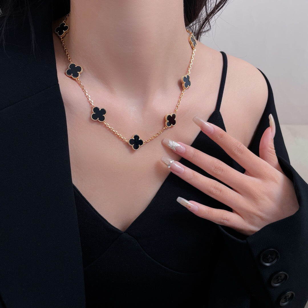 {
"Bling Jewelrys ": "Bling Jewelrys ",
"CLOVER 10 MOTIFS ONYX NECKLACE": "KLEEBLATT 10 MOTIVE ONYX HALSKETTE"
}