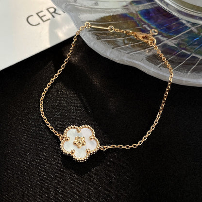 [Bling Jewelry] GLÜCKSBRACELETT MIT WEISSER PERLMUTT-PFLAUMENBLÜTE