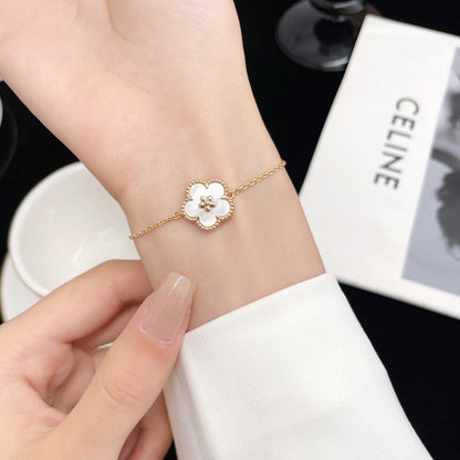 [Bling Jewelry] GLÜCKSBRACELETT MIT WEISSER PERLMUTT-PFLAUMENBLÜTE