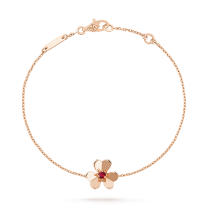 {
  "Bling Jewelrys ": "FRIVOLE GOLD BLUMEN-ARMBAND MIT ROSA MALACHIT"
}