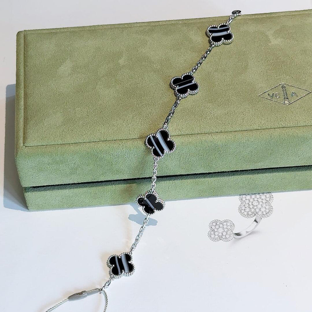 [Bling Jewelrys] KLEEBATT-ARMBAND MIT 5 MOTIVEN AUS GEADERTEM ONYX SILBER
