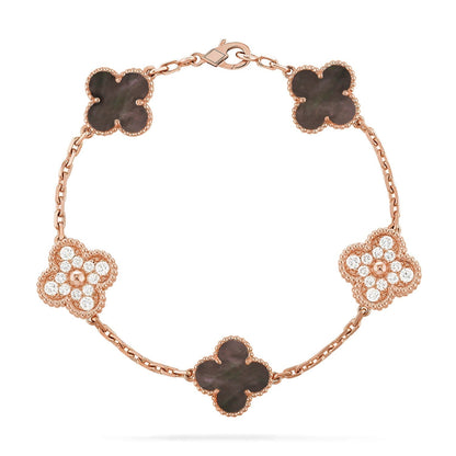 {
  "Bling Jewelrys": "Bling Jewelry",
  "CLOVER 5 MOTIF GRAY MOP BRACELET COLLECTION": "KLEEBLATT 5-MOTIV GRAU PERLMUTT ARMBAND KOLLEKTION"
}