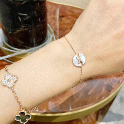 {
  "Bling Jewelrys": "Bling Jewelrys",
  "JEUX DE BRACELET MOP PINK GOLD DIAMONDS": "ARMBAND-SET PERLMUTT ROSÉGOLD DIAMANTEN"
}