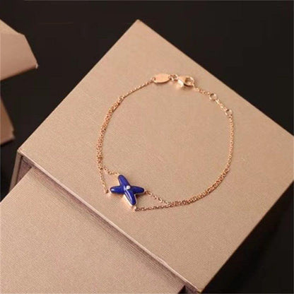 [Bling Jewelrys ]Hollow Design Four-Leaf Clover Flower Shape Bracelet