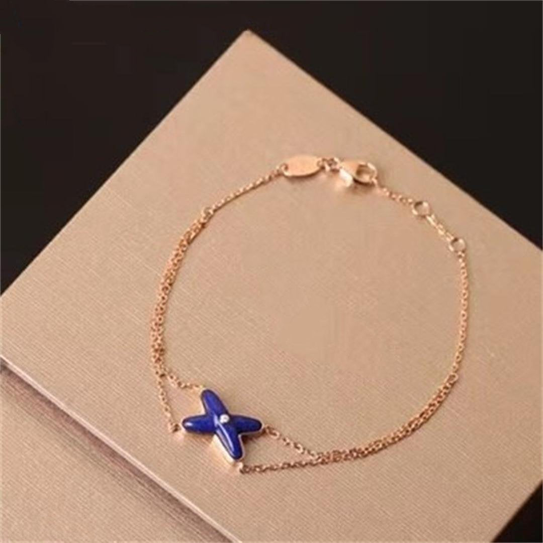 [Bling Jewelrys ]Hollow Design Four-Leaf Clover Flower Shape Bracelet