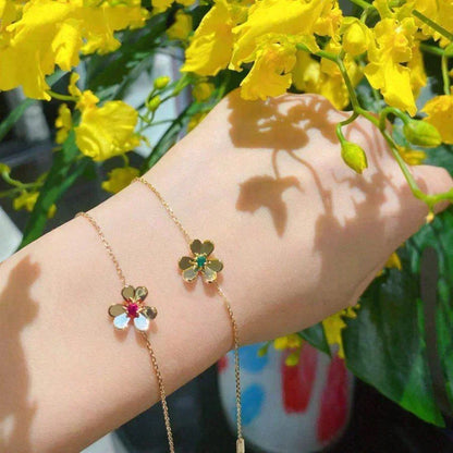 {
  "Bling Jewelrys ": "FRIVOLE GOLD BLUMEN-ARMBAND MIT ROSA MALACHIT"
}