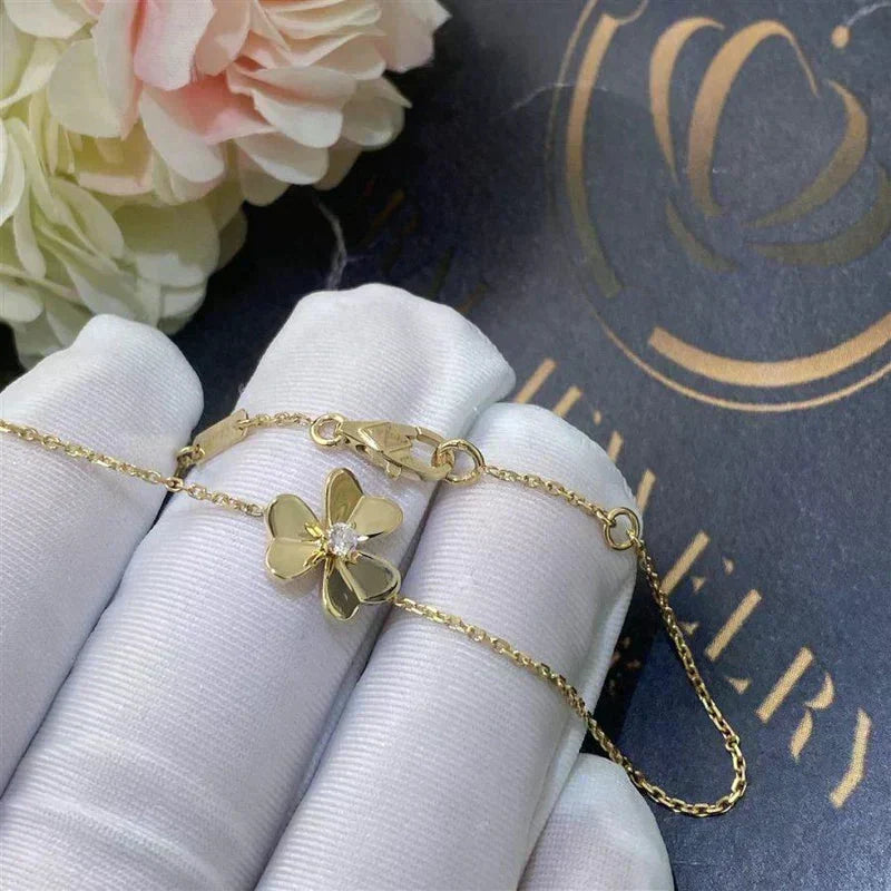 {
  "Bling Jewelrys ": "FRIVOLE GOLD BLUMEN-ARMBAND MIT ROSA MALACHIT"
}