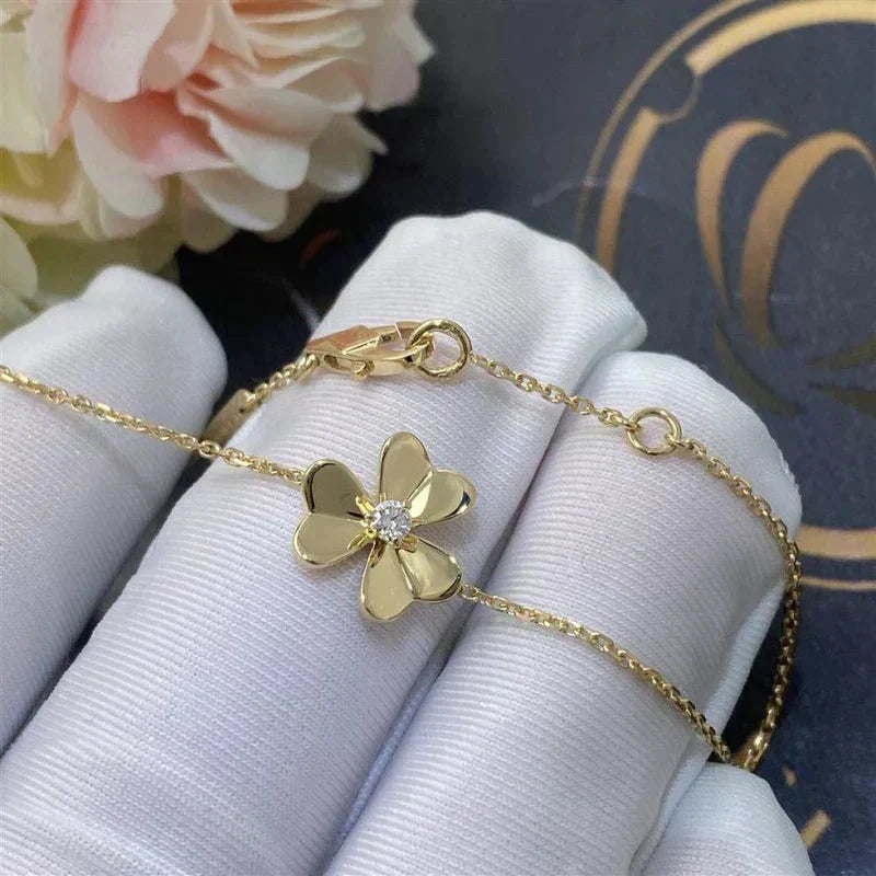 {
  "Bling Jewelrys ": "FRIVOLE GOLD BLUMEN-ARMBAND MIT ROSA MALACHIT"
}
