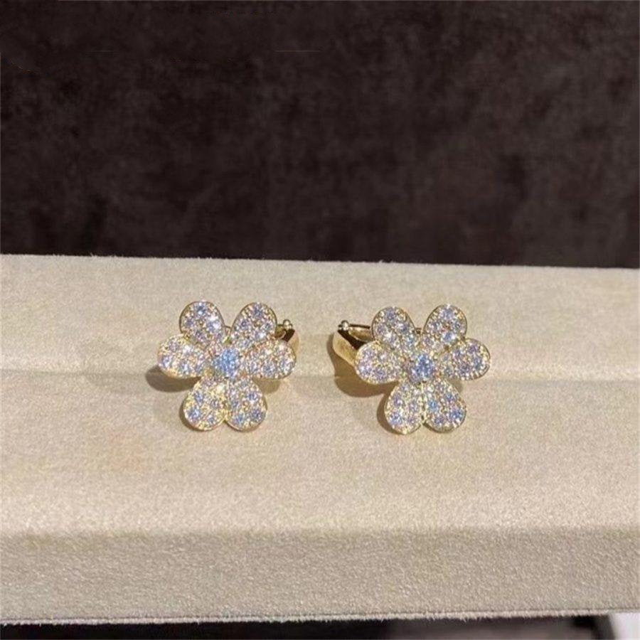 {
  "Bling Jewelrys ": "Bling Jewelrys ",
  "FRIVOLE GOLD FLOWER DIAMOND EARRINGS": "FRIVOLE GOLD BLUMEN DIAMANTOHRRINGE"
}