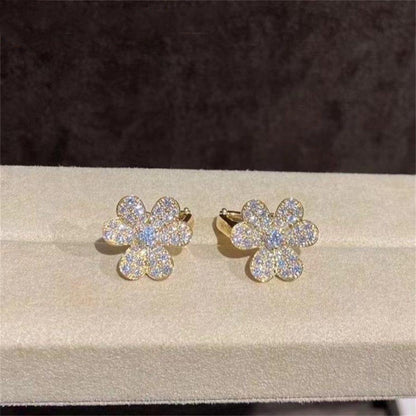 {
  "Bling Jewelrys ": "Bling Jewelrys ",
  "FRIVOLE GOLD FLOWER DIAMOND EARRINGS": "FRIVOLE GOLD BLUMEN DIAMANTOHRRINGE"
}